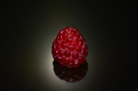 Beautiful raspberry berry with water dropsの写真素材