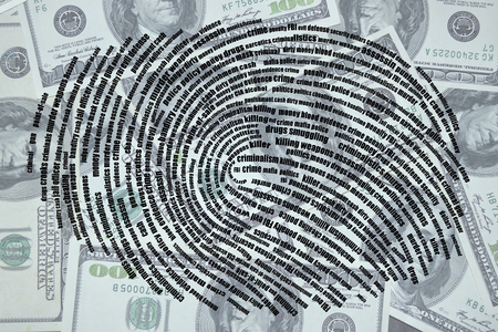 Words in the form of a fingerprint on the background of dollarsの写真素材