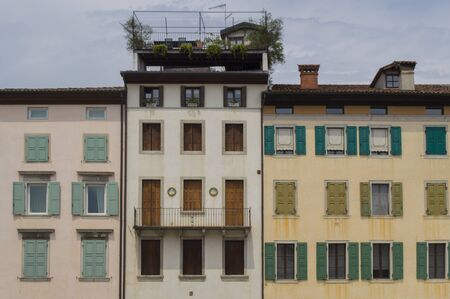 Old buildings on narrow italian streetsの写真素材