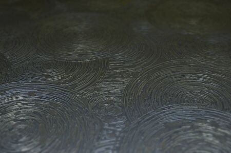 Decorative stucco background with abstract circles.