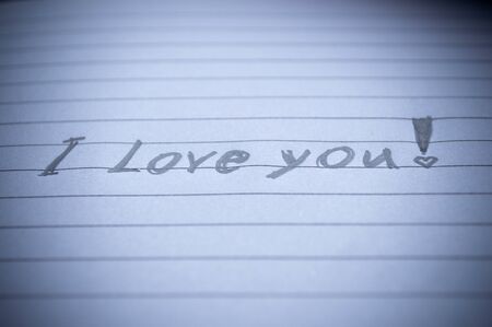 I LOVE YOU written in pencil on paper close upの写真素材