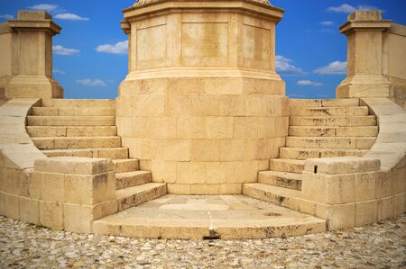 Beautiful antique staircase on a background of blue sky in detailの写真素材