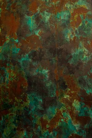 The surface of the old rusty metal with the effect of old paint and scuff in detail