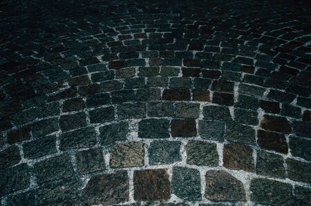 Close up detailed view on cobblestone pavement in detail