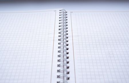 Notebook binding with white blank sheet in detail