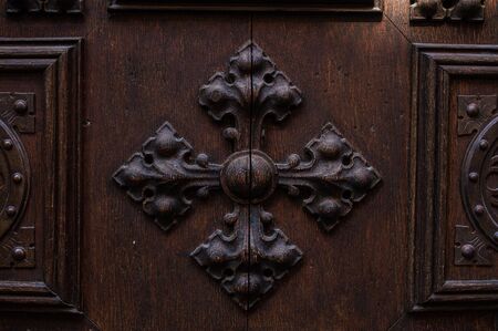 Beautiful carvings on old wooden doors in detailの写真素材