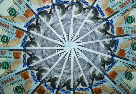Top view of one hundred dollar banknotes made as a background. USD currency concept. Texture of...