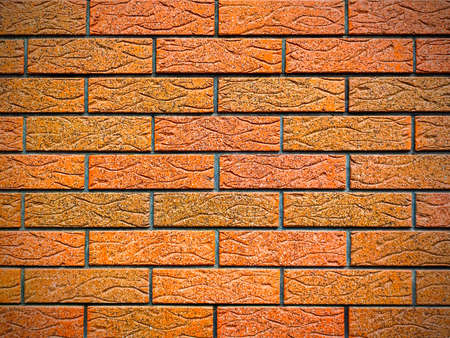Brick wall with corrugated brick close up in detailの写真素材