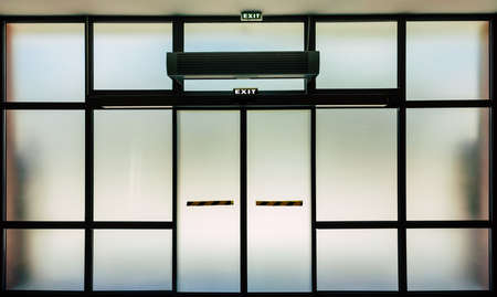 Interior glass door in building close upの写真素材