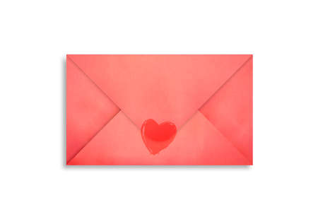 Valentine's Day. Postal red envelope with a heart on a white background close up.