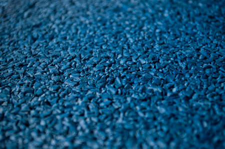 Background from granules of blue color close up in details.
