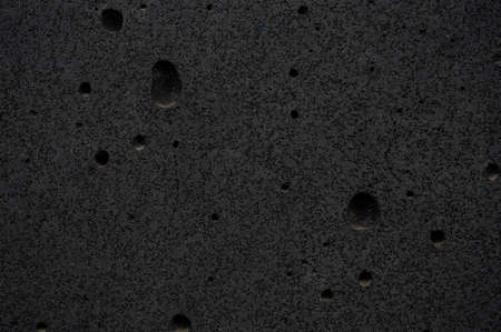 Texture of polished stone with pores close up.の写真素材