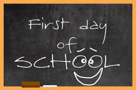First day of school. Text on the blackboard close up.の写真素材