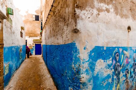 Persons in narrow streets in the city of Essaouiraの写真素材