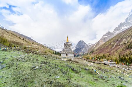 View on tibetan Stupa with colorful buddhist prayer flagsの写真素材