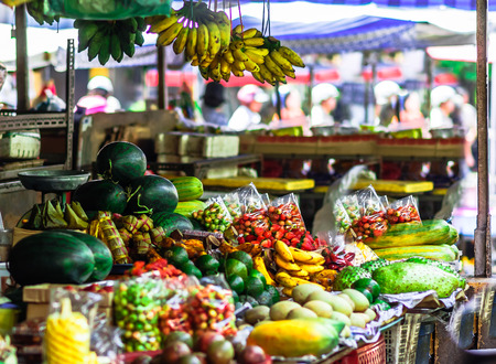 View on fresh fruits and vegtebales on market in Vietnamの写真素材