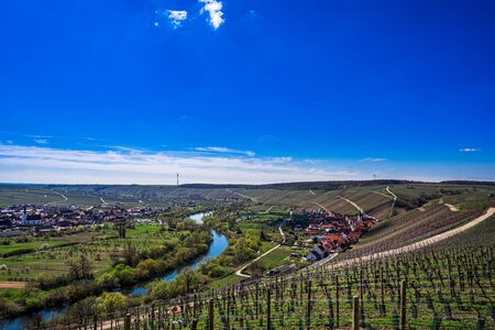 View over the idyllic Main Valley, the vineyards, the Main Loop at the town of Volkach - Germany