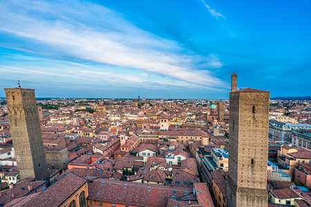 Aerial view of Bologna Cathedral and towers above of the roofs of Old Town in medieval city Bologna....