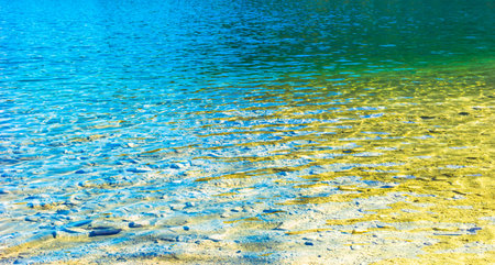 Texture of turquoise lake water of mountain lakeの写真素材