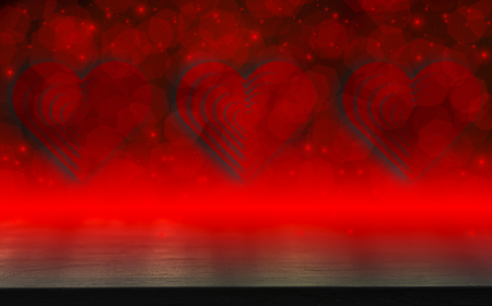 Dark wood table,Valentines day concept and love red shape heart with bokeh background, empty for text and placing products with copy space.の写真素材