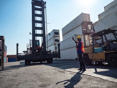 Foreman engineering manager wear red safety and hat yellow helmet company is calling telephone...
