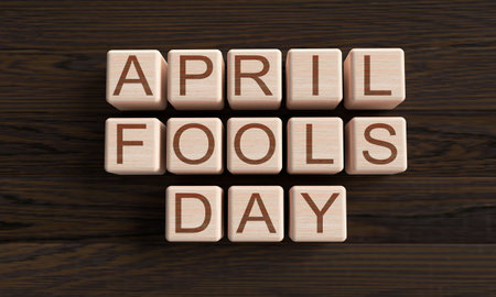april fools day font text calligraphy block wooden cube oak symbol decoration april joke party festival celebration april fools day comedy carnival 1 st first date fake day harlequの写真素材