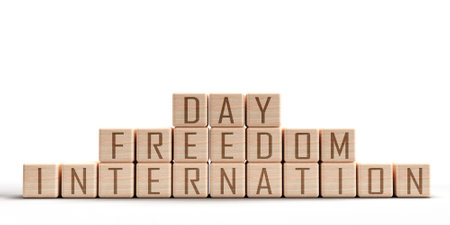 Cube block wooden international freedom day font text calligraphy symbol decoration human right democracy happy woman female lady male man justice journalism independence violenceの写真素材