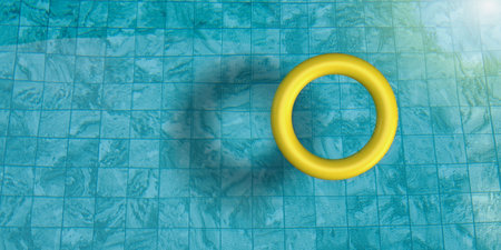 Rubber ring swimming pool blue green color waving texture background circle round yellow orange copy...