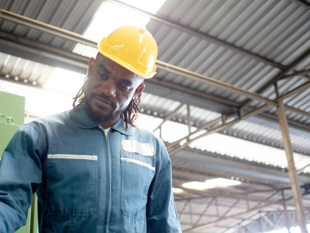 Foreman labor staff man male person people black african south yellow hardhat helmet safety blue...