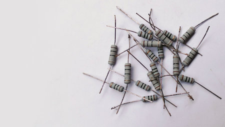 Stack of electronic resistors on a white backgroundの写真素材