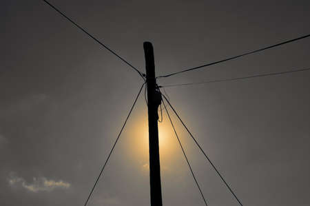 The pole blocks the sun