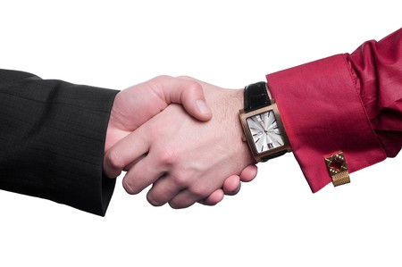 Business handshake isolated on white