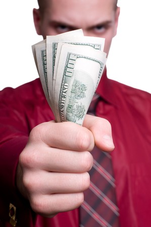 Businessman with gun and money. Isolated on whiteの写真素材