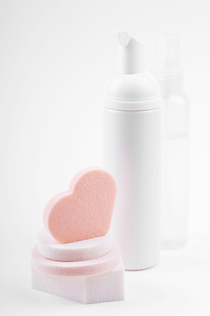 cosmetic bottles and spongeの写真素材