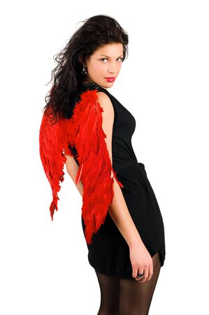 Beautiful girl with red angel wings isolated on whiteの写真素材