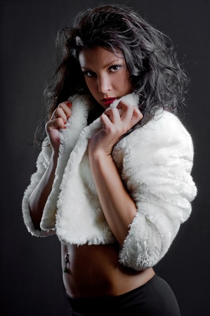 beautiful sexy girl in fur coatの写真素材