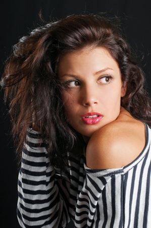 art fashion photo of portrait young woman on dark backgroundの写真素材