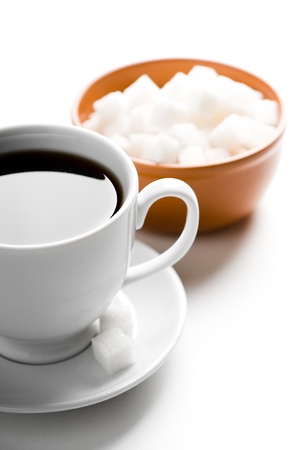 Cup of coffee and plate with sugarの写真素材