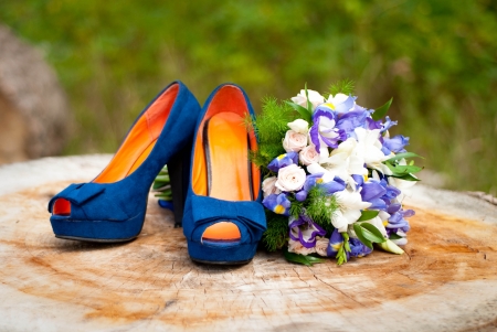 Blue wedding accessories on woodの写真素材