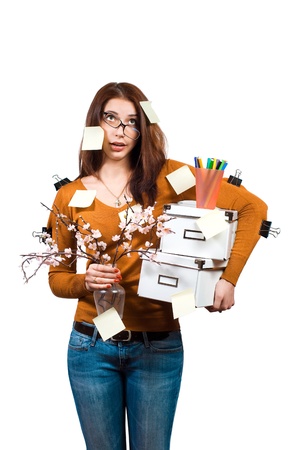 Young beautiful girl looking at copyspace having a surprised or satisfied look isolated on whiteの写真素材