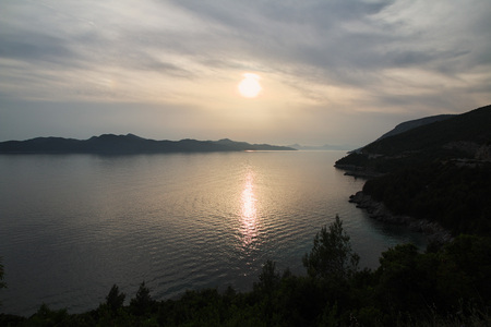 Sumset at coast of the Adriatic sea, Croatia