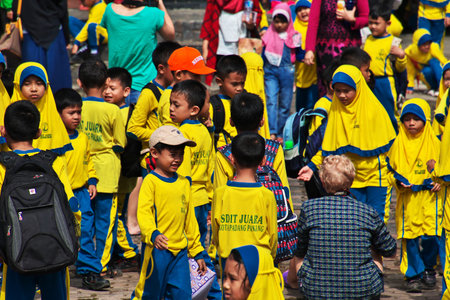 Padang, Indonesia - 30 Jul 2016. Some schoolchild on a tour in the temple close Padang, Indonesia