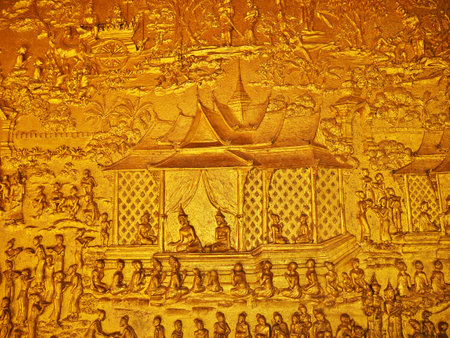 Luang Prabang / Laos - 25 Feb 2012: The golden wall in the ancient Wat in Luang Prabang, Laosのeditorial素材