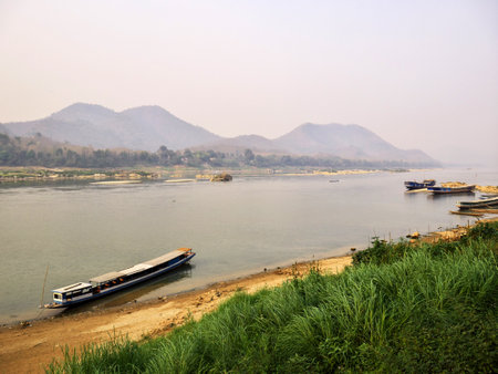 Luang Prabang / Laos - 25 Feb 2012: The boat on Mekong river in Luang Prabang, Laosのeditorial素材