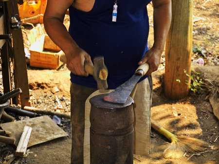 Pakse / Laos - 29 Feb 2012: The local smithy in Laosのeditorial素材