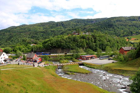Steinsdalsfossen / Norway - 26 Jun 2012: The small village close Steinsdalsfossen waterfall in Norway, Scandinaviaのeditorial素材