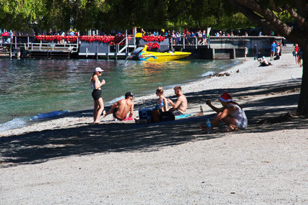 Queenstown / New Zealand - 23 Dec 2018: The beach in Queenstown city on South island, New Zealandのeditorial素材