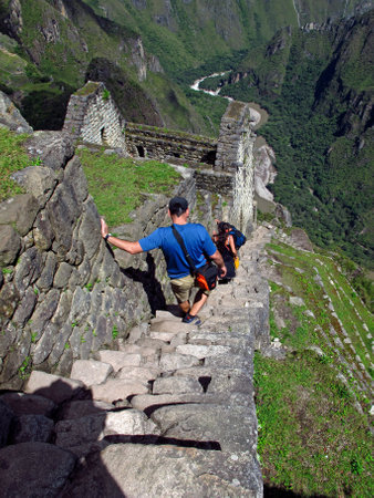 Machu Picchu / Peru - 04 May 2011: People in Machu Picchu, capital of the Inca Empire in the Andes mountains, Peru, South Americaのeditorial素材