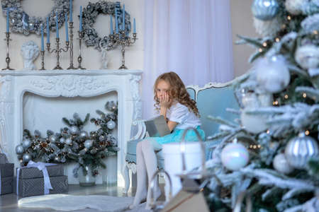 The girl is upset with a New Years giftの写真素材