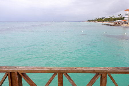 View from the pier to the beautiful sea and the sandy Caribbean coast,lighthouseの写真素材